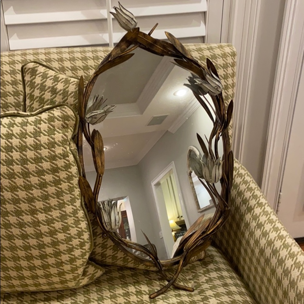 Mirror with decorative gold leaves and flowers